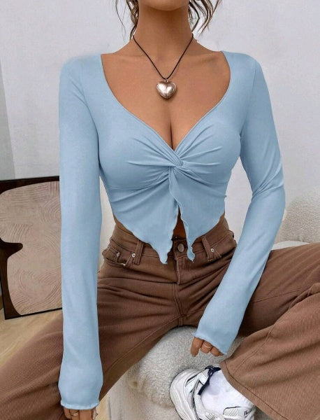 TOP MANGA LARGA CUELLO V